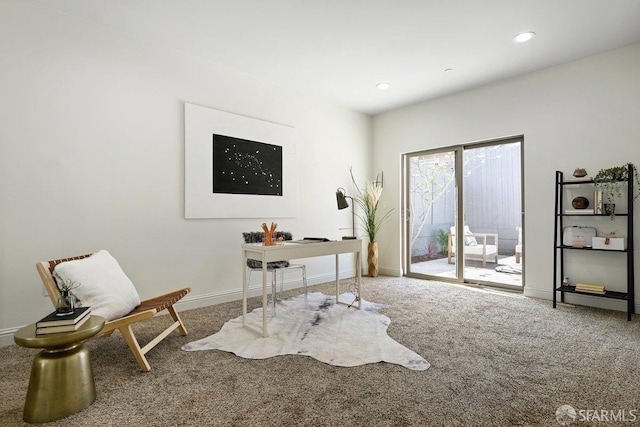 interior space with baseboards and recessed lighting
