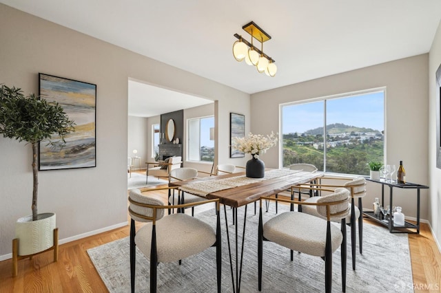 316 Gold Mine Dr, San Francisco, CA 94131 - dining room featuring light wood-type flooring and baseboards