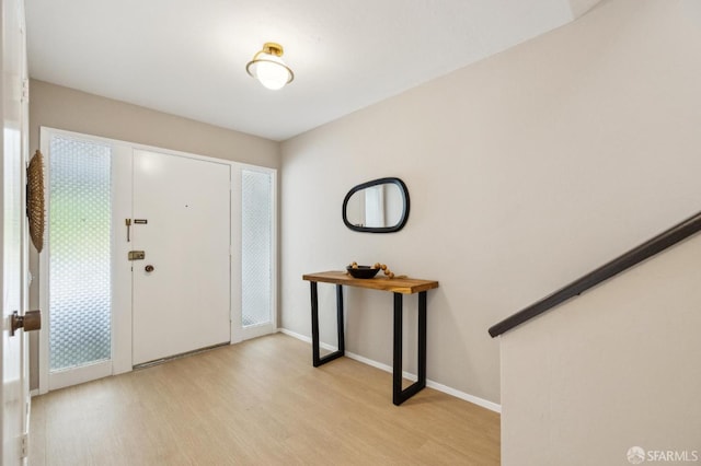 316 Gold Mine Dr, San Francisco, CA 94131 - entryway with baseboards and light wood-style floors