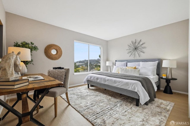 316 Gold Mine Dr, San Francisco, CA 94131 - bedroom with light wood finished floors and baseboards