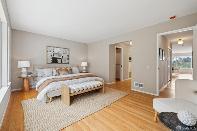 316 Gold Mine Dr, San Francisco, CA 94131 - bedroom featuring baseboards, visible vents, and wood finished floors
