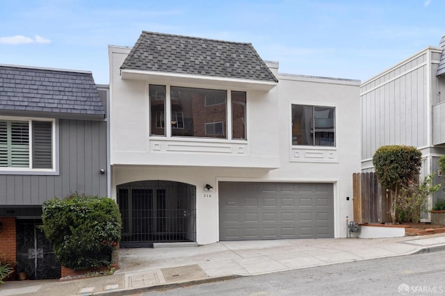 316 Gold Mine Dr, San Francisco, CA 94131 - view of front of home with driveway, fence, a shingled roof, and an attached garage