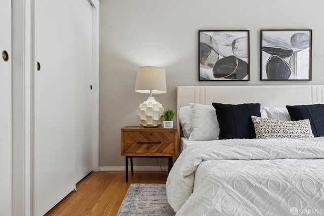316 Gold Mine Dr, San Francisco, CA 94131 - bedroom featuring baseboards, wood finished floors, and a closet