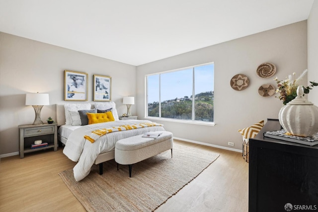 316 Gold Mine Dr, San Francisco, CA 94131 - bedroom with baseboards and light wood-style flooring