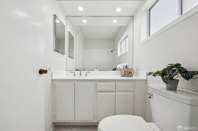 316 Gold Mine Dr, San Francisco, CA 94131 - full bathroom with recessed lighting, toilet, vanity, baseboards, and a shower