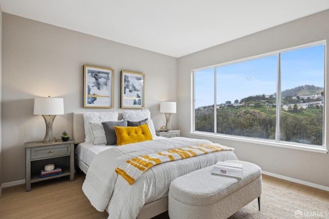 316 Gold Mine Dr, San Francisco, CA 94131 - bedroom featuring baseboards and wood finished floors