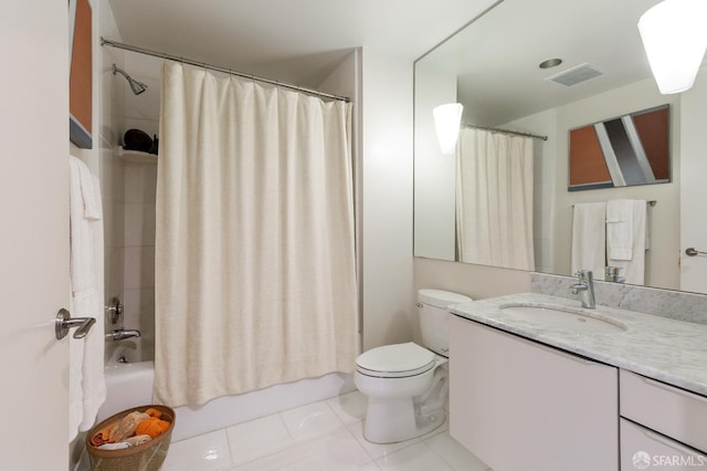 full bathroom with shower / tub combo with curtain, vanity, toilet, and tile patterned flooring