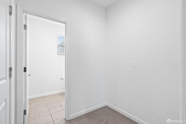 interior space with light tile patterned floors