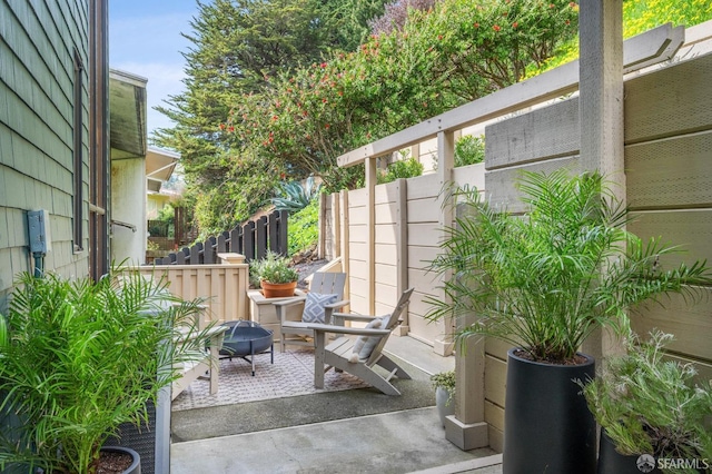 view of patio with fence