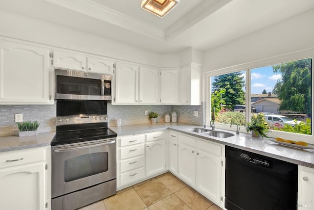 1723 Astoria Dr, Fairfield, CA 94534 - kitchen with appliances with stainless steel finishes, light tile patterned floors, white cabinets, decorative backsplash, and crown molding