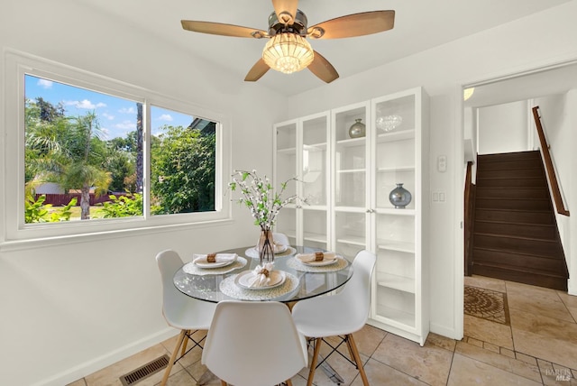 1723 Astoria Dr, Fairfield, CA 94534 - dining area with stairway and ceiling fan