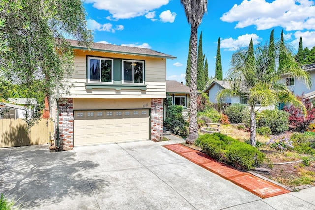 1723 Astoria Dr, Fairfield, CA 94534 - view of front of property with brick siding, an attached garage, and driveway