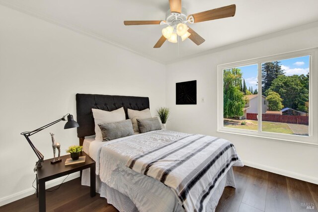 1723 Astoria Dr, Fairfield, CA 94534 - bedroom with dark wood-style floors, ornamental molding, and a ceiling fan