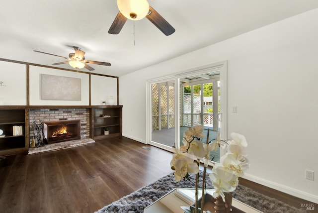 1723 Astoria Dr, Fairfield, CA 94534 - living room featuring dark wood finished floors, ceiling fan, and a fireplace