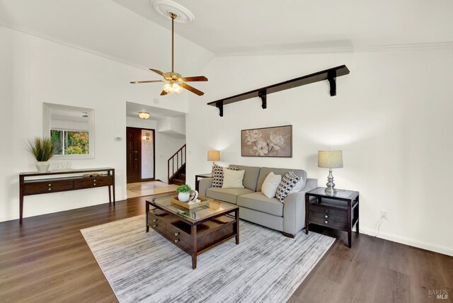 1723 Astoria Dr, Fairfield, CA 94534 - living room featuring stairway, wood finished floors, ceiling fan, and lofted ceiling