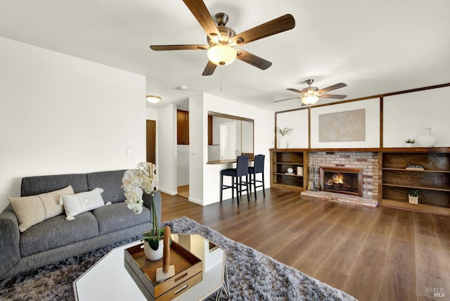 1723 Astoria Dr, Fairfield, CA 94534 - living room featuring a ceiling fan, wood finished floors, and a brick fireplace