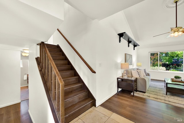 1723 Astoria Dr, Fairfield, CA 94534 - staircase featuring ceiling fan, wood finished floors, and lofted ceiling