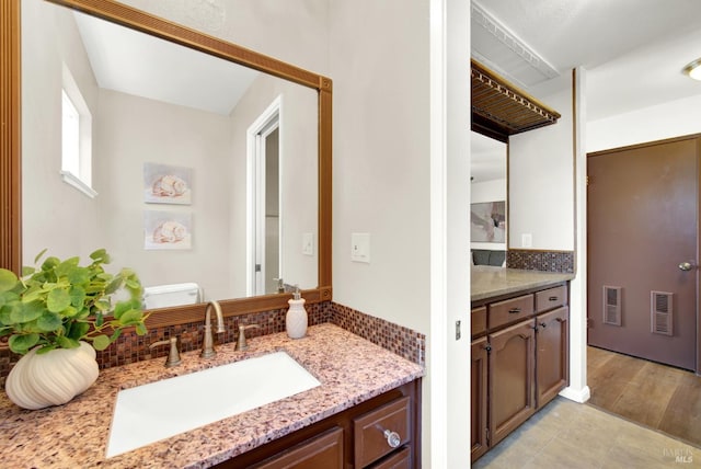 1723 Astoria Dr, Fairfield, CA 94534 - bathroom featuring vanity and backsplash