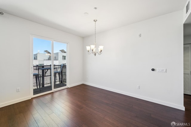 50 Jerrold Ave Unit 305, San Francisco, CA 94124 - spare room with a chandelier, dark wood-type flooring, and baseboards