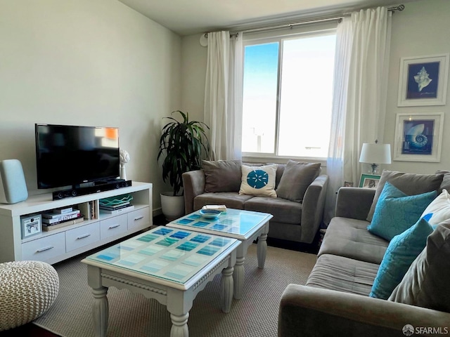 living room featuring light carpet