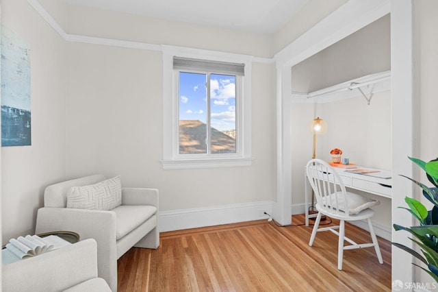 home office with hardwood / wood-style flooring