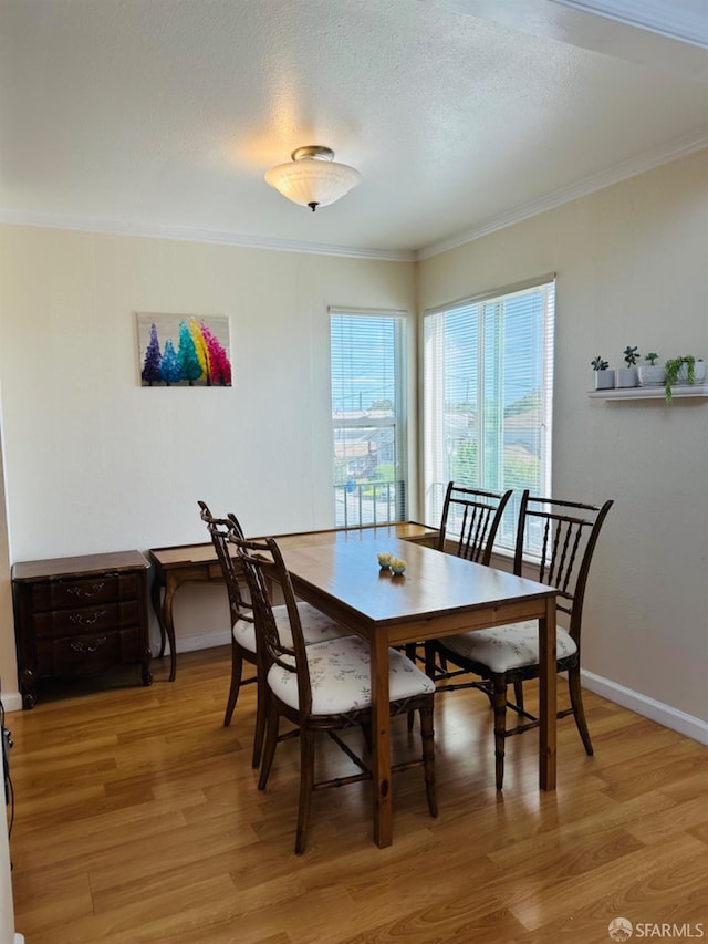 15 Mateo Ave Unit 7, Millbrae, CA 94030 - dining room featuring light wood-style flooring, crown molding, and baseboards
