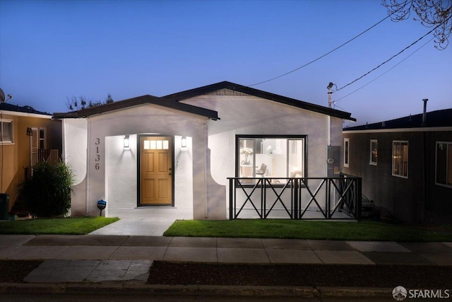 view of front of house with stucco siding