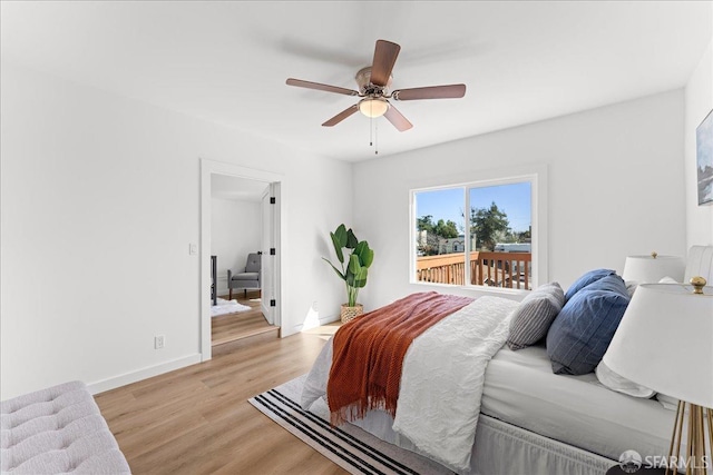 bedroom with baseboards, ceiling fan, and light wood finished floors