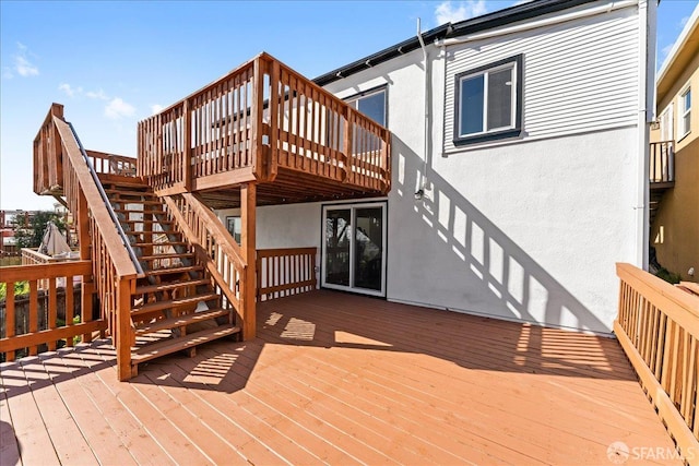 deck featuring stairs