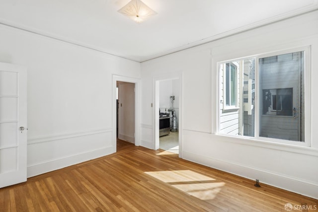 1915 Laguna St Unit 2, San Francisco, CA 94115 - empty room with baseboards and light wood finished floors