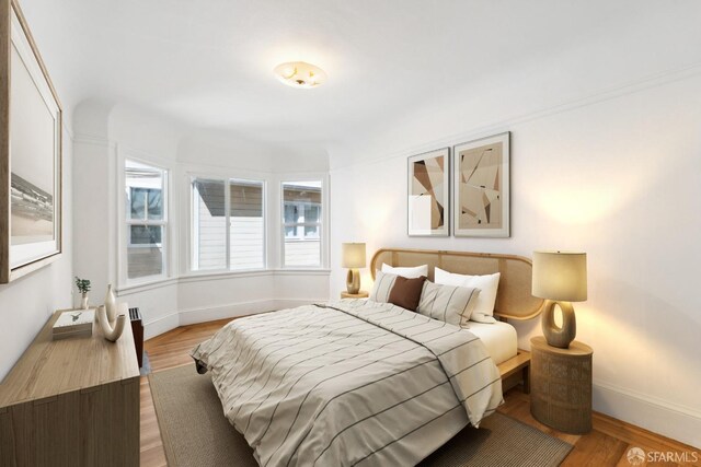 1915 Laguna St Unit 2, San Francisco, CA 94115 - bedroom featuring baseboards and wood finished floors