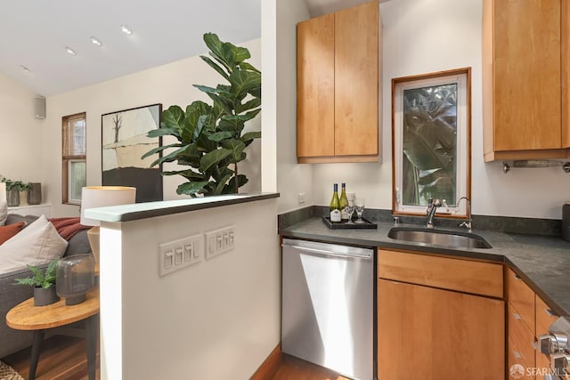 762 Bay St, San Francisco, CA 94109 - kitchen with dishwasher, a sink, dark countertops, open floor plan, and a peninsula