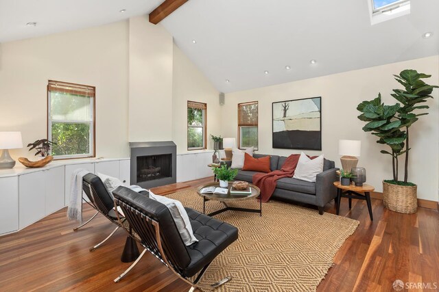 762 Bay St, San Francisco, CA 94109 - living area with wood finished floors, high vaulted ceiling, beam ceiling, a fireplace, and recessed lighting