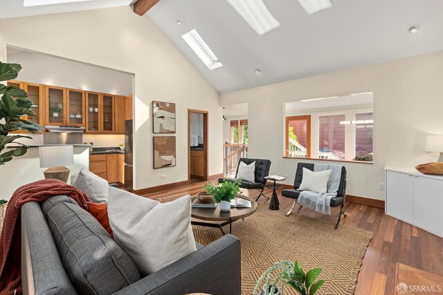 762 Bay St, San Francisco, CA 94109 - living room with a skylight, high vaulted ceiling, wood finished floors, beamed ceiling, and baseboards