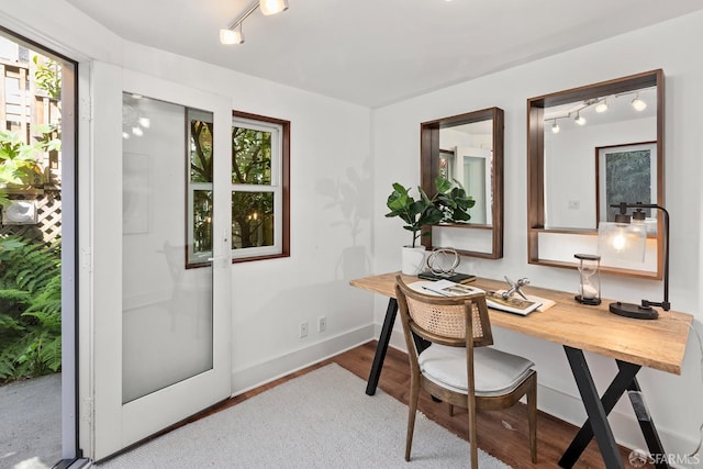 762 Bay St, San Francisco, CA 94109 - home office with wood finished floors, baseboards, and rail lighting