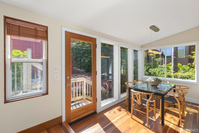 762 Bay St, San Francisco, CA 94109 - sunroom / solarium featuring wood finished floors, baseboards, and vaulted ceiling