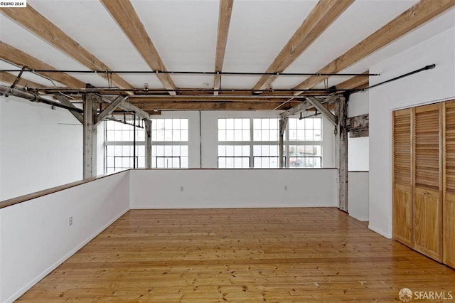 spare room featuring light hardwood / wood-style floors