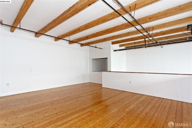 spare room featuring hardwood / wood-style floors