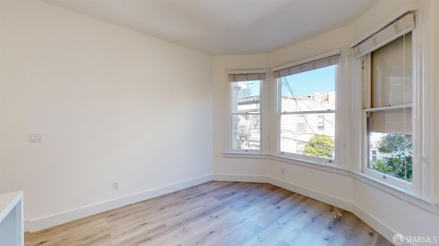 1338 Stevenson St, San Francisco, CA 1906 - unfurnished room with light wood-type flooring and baseboards