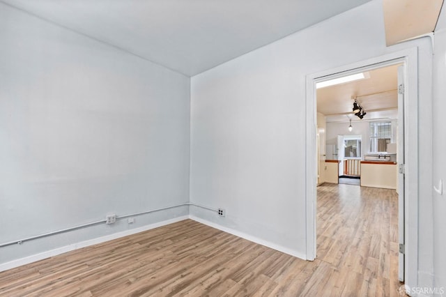 737 Minna St, San Francisco, CA 94103 - empty room featuring baseboards and wood finished floors