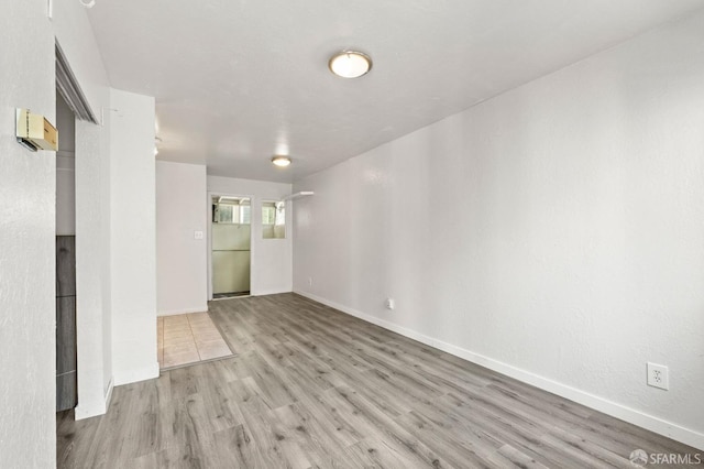 737 Minna St, San Francisco, CA 94103 - empty room with baseboards and light wood finished floors