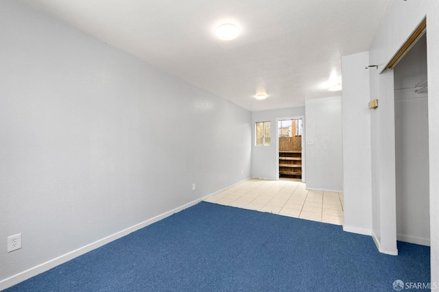 737 Minna St, San Francisco, CA 94103 - below grade area with baseboards, carpet, and tile patterned floors