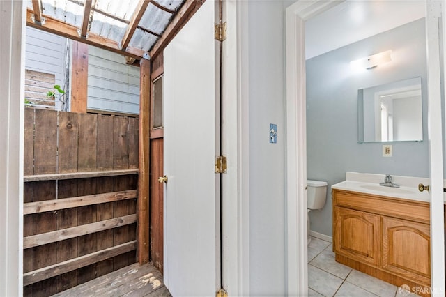 737 Minna St, San Francisco, CA 94103 - bathroom featuring vanity, tile patterned floors, and toilet