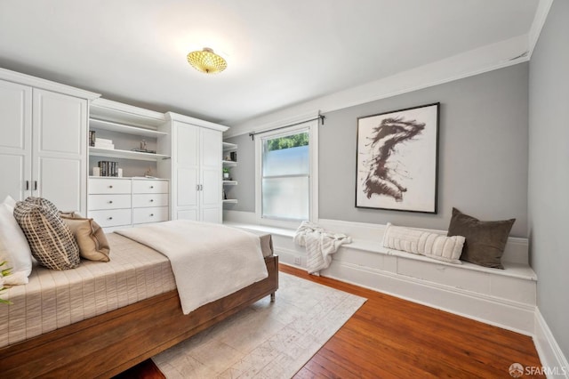 47 Octavia St, San Francisco, CA 94102 - bedroom featuring multiple closets and wood finished floors