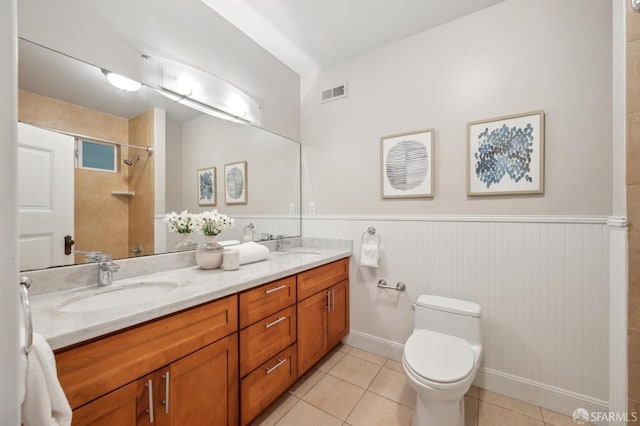 47 Octavia St, San Francisco, CA 94102 - bathroom featuring tiled shower, toilet, visible vents, and a sink