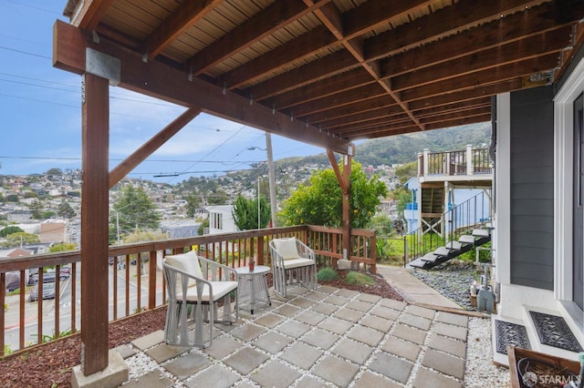 view of patio with stairway