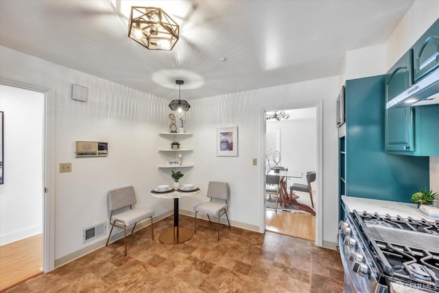 living area with visible vents and baseboards