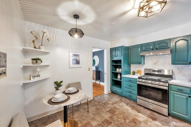 kitchen featuring open shelves, tasteful backsplash, light countertops, gas range, and under cabinet range hood