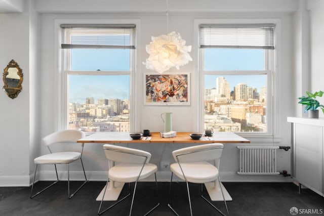 tiled dining space with radiator