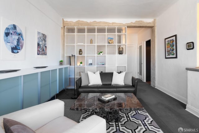 living room featuring dark tile patterned floors